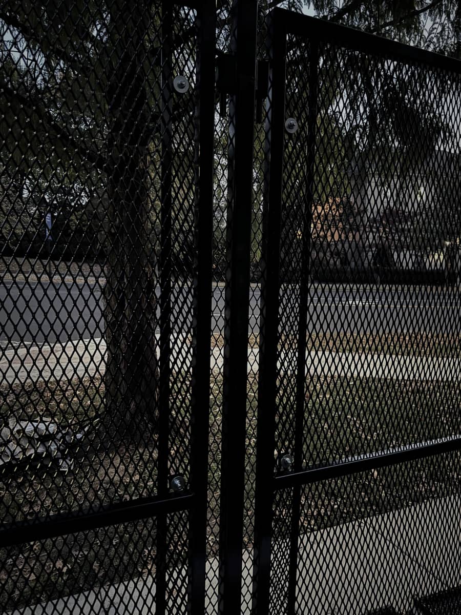 Detail of anti-climb mesh infill and vertical post