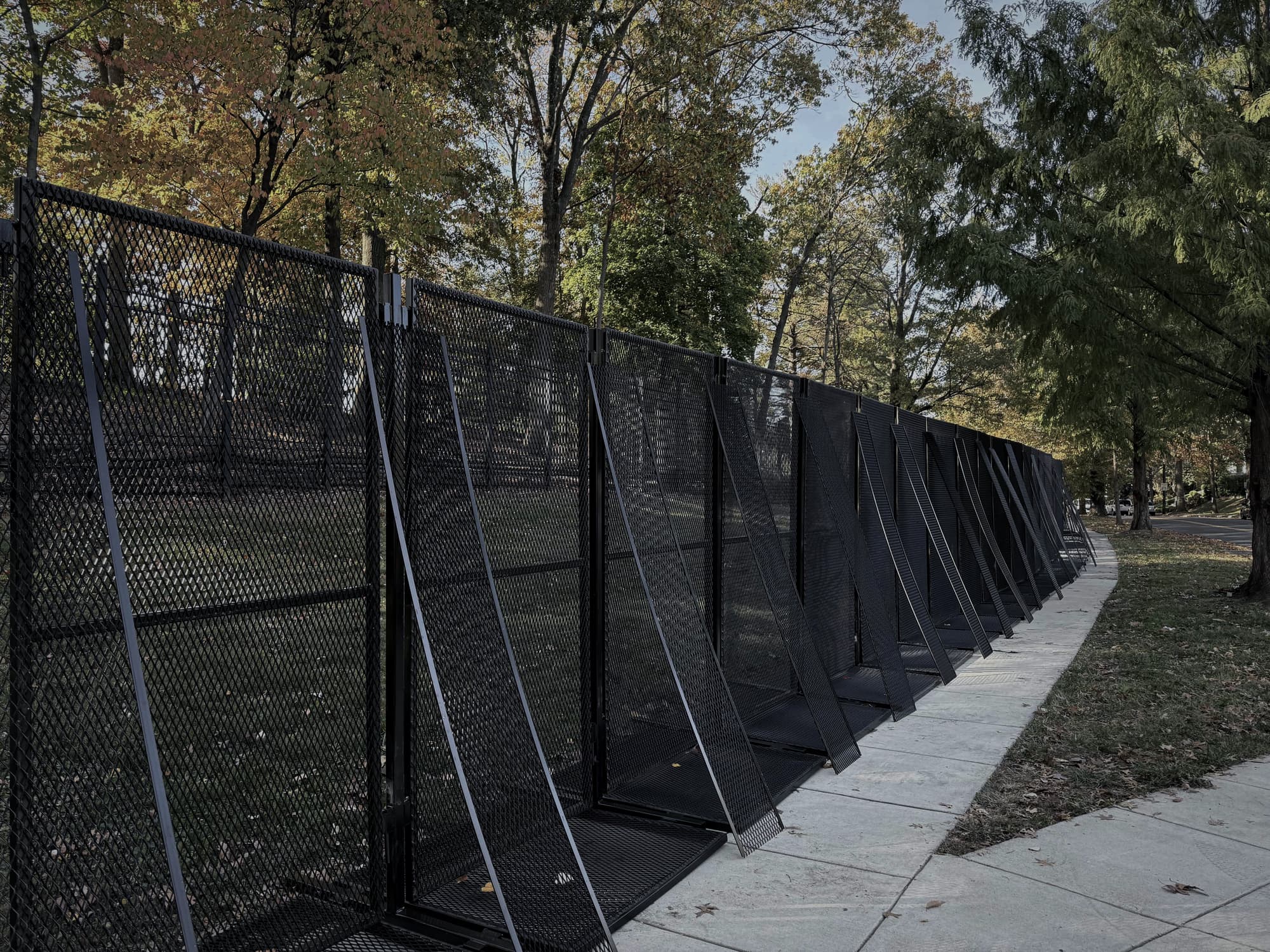Extended run of RMR Pro anti-climb fencing securing a street perimeter